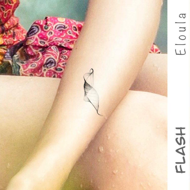 Photomontage d’un tatouage d’une feuille courbée recroquevillée XRay sur un bras angouleme