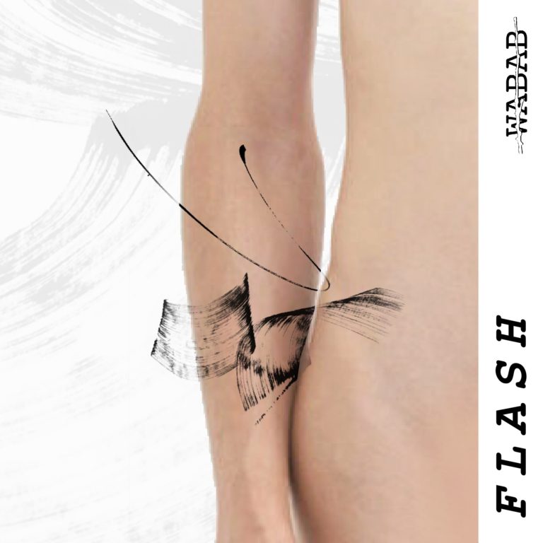 Photomontage de tatouage abstrait coup de pinceau sur le bras, angouleme